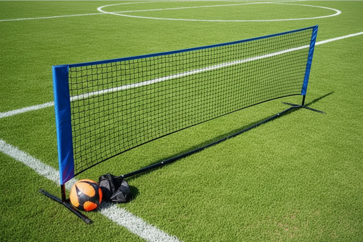 Football tennis net on grass with a soccer ball, ideal for indoor and outdoor play and easy to transport.
