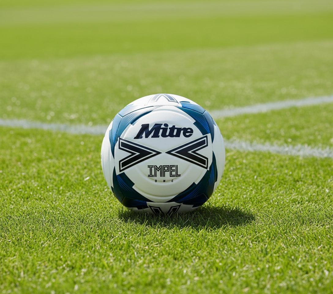 Mitre Impel One football with unique 6-panel design, featuring high-quality soft-touch foam for improved performance.